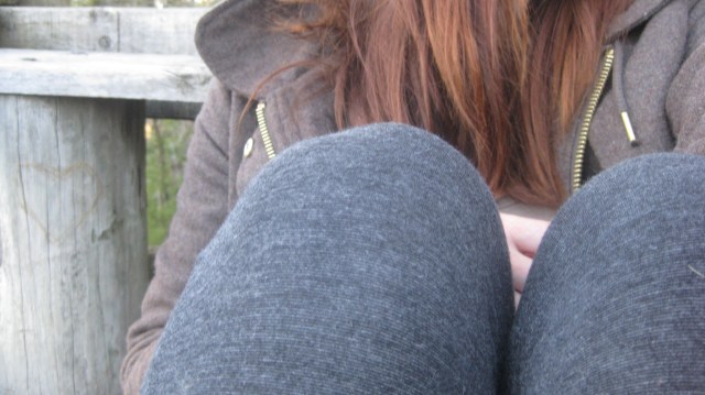 heart carved in wood girl sitting