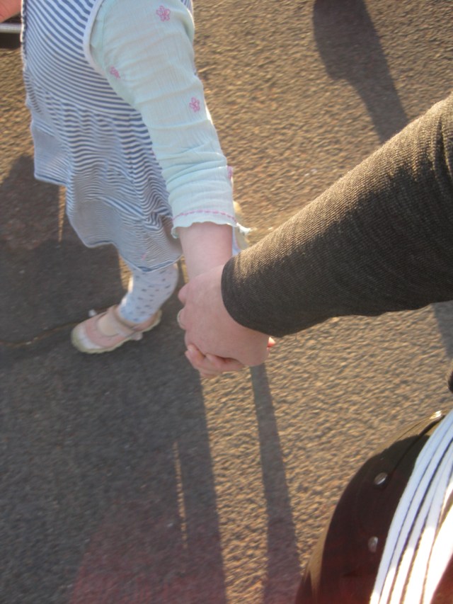 grown up holding hands with a child joy cowley poem bridges