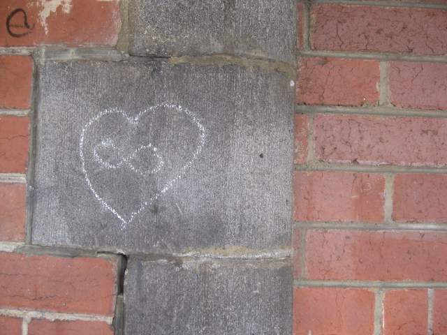 chalk drawing infinity and heart