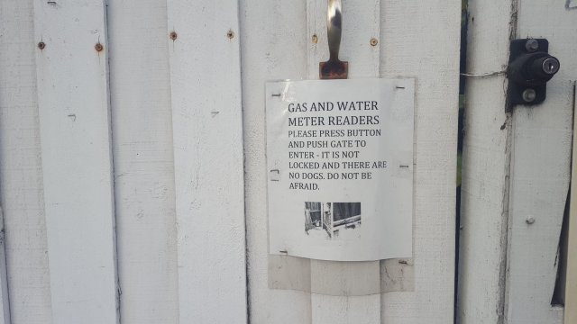 funny signs on gates for meter readers