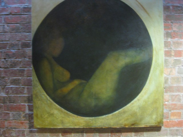 painting of a naked woman in the dark