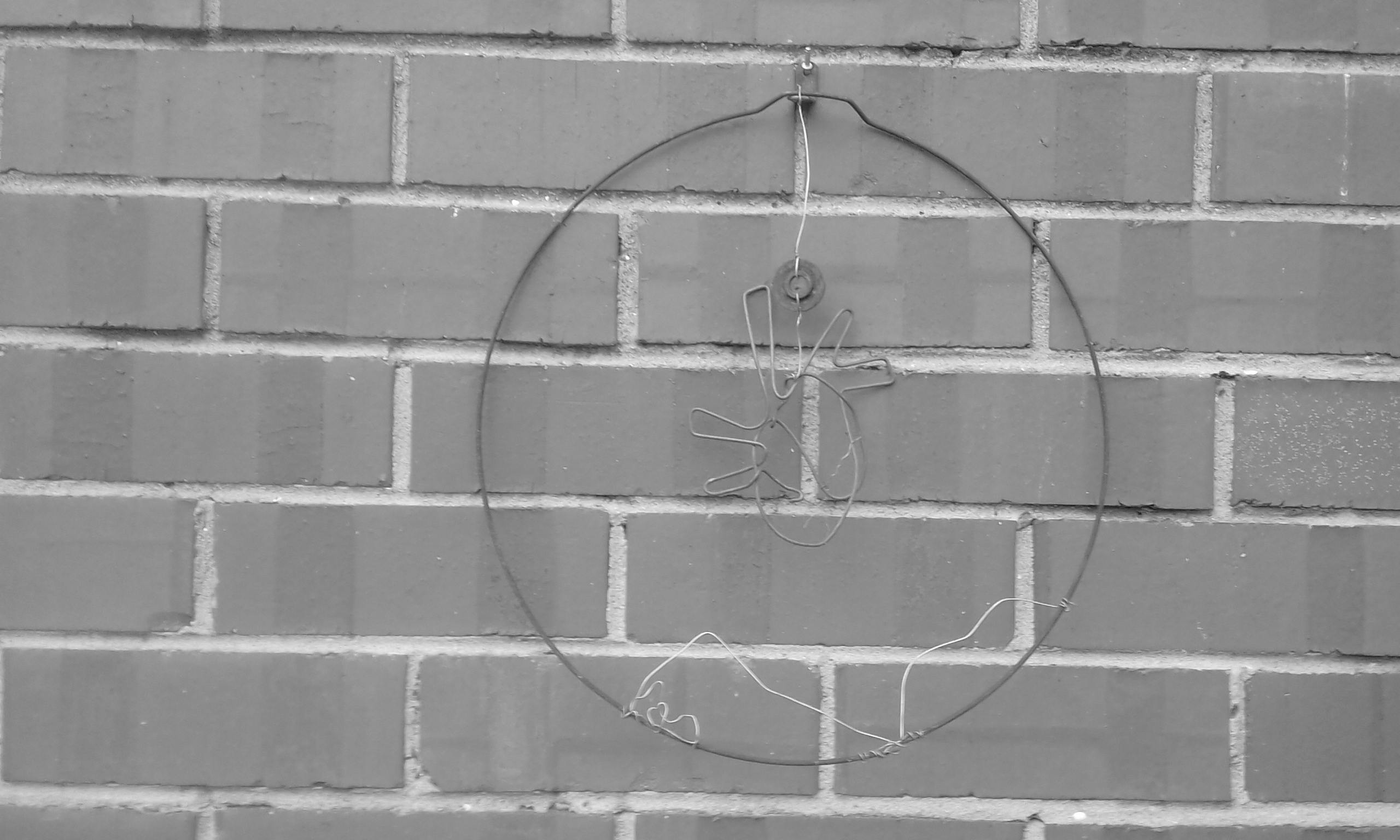 scrap metal sculpture art hanging heart land mountains